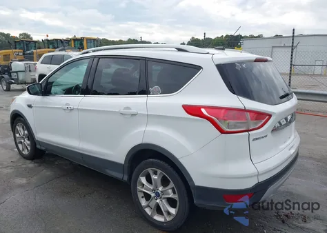 2014 Ford Escape Titanium z USA, uszkodzony, nr VIN 1FMCU9JX7EUB36879